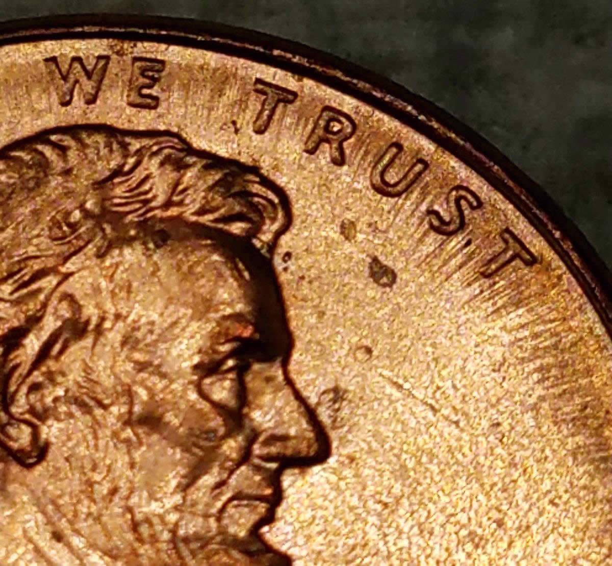 2004-P-Lincoln-Split-Planchet-Top-Of-United-On-The-Reverse?
